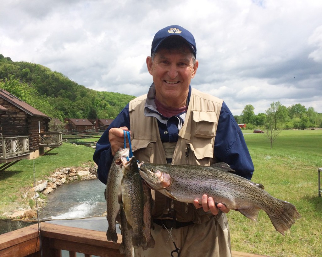 Senator Joe Manchin with a fish