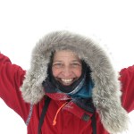 Chris Fagan smiling at the camera in a red parka.