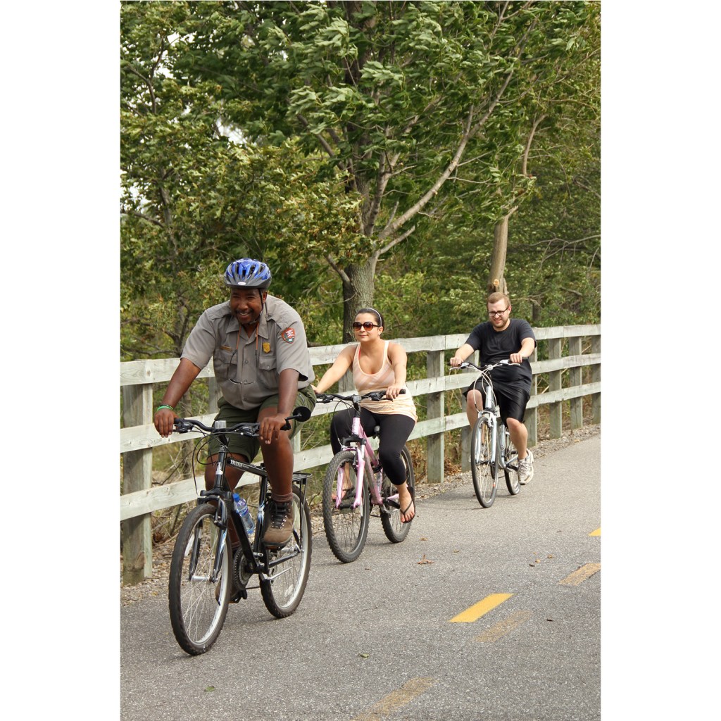 Outreach Coordinator Kip Walton leads a bike hike along a stretch of the park's 37 miles of interconnected bike trails. 