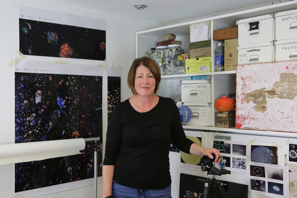 Artist Mandy Barker poses in her studio.