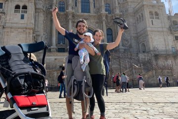 The Muldoons in front of Santiago de Compostela Cathedral, the culmination of their Camino Francés hike.