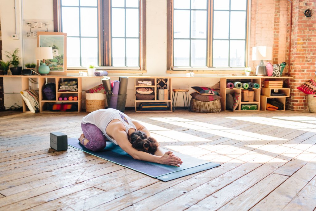 Yogi doing child's pose