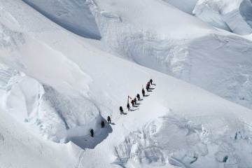 The drilling team hikes up Huascarán in 2019.