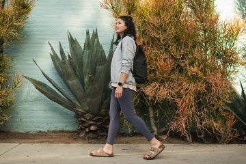 Person walking on a sidewalk