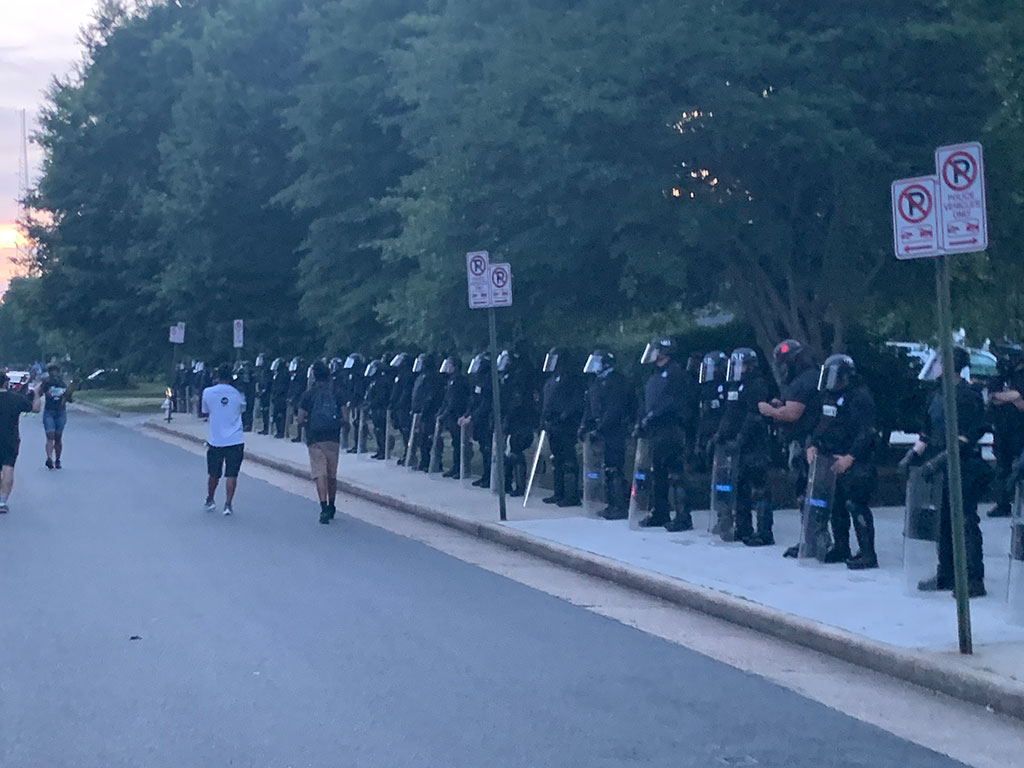 A line of police at the Stonewall Rising march