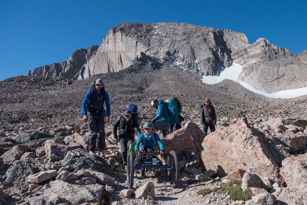 Quinn Brett powers through the Boulder Field on her ReActive Adaptations bike near Longs Peak 