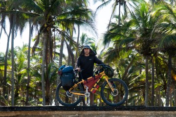 Mario Ordoñez-Calderón with bikepacking gear along Yucatan Peninsula bike route