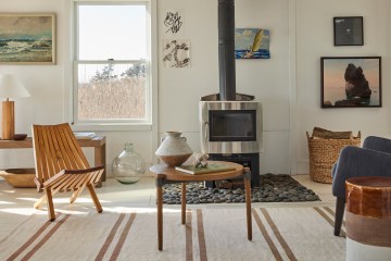The interior of a living room with outdoor furnishings brought inside