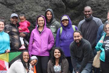 Large of people smiling outdoors