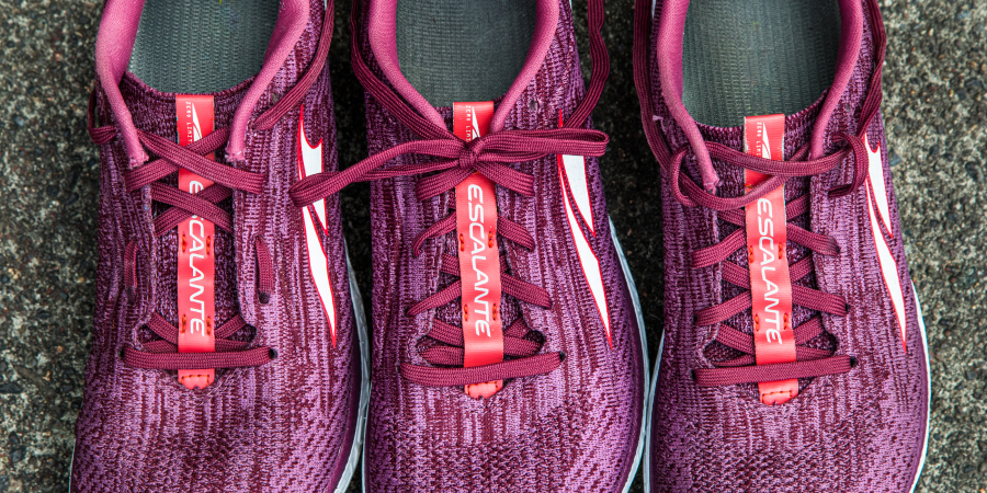 Three purple Altra Escalante left-foot running shoes showing different lacing techniques.