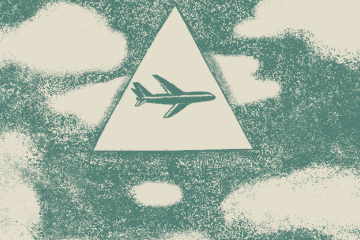 a plane in the middle of a triangle with a cloud covered backdrop