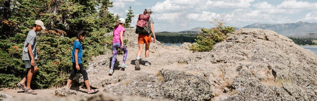 A family hikes together.