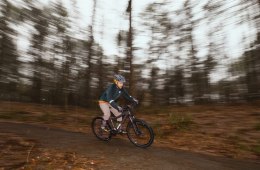 A person rides a bike in a wooded area near Atlanta