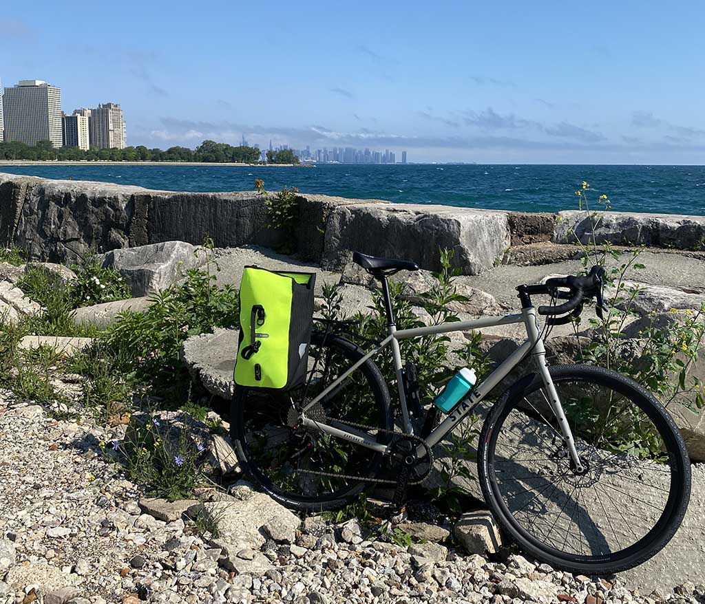 Brian Rau's bike—including his Ortlieb Sport-Roller High Visibility Panniers—on a trail in the Chicago area.