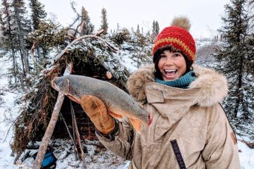 Kielyn Marrone holding up a fish in the wild