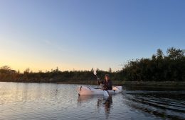 Author Keith Erps paddling on a lake in the Oru Kayak Lake Kayak.