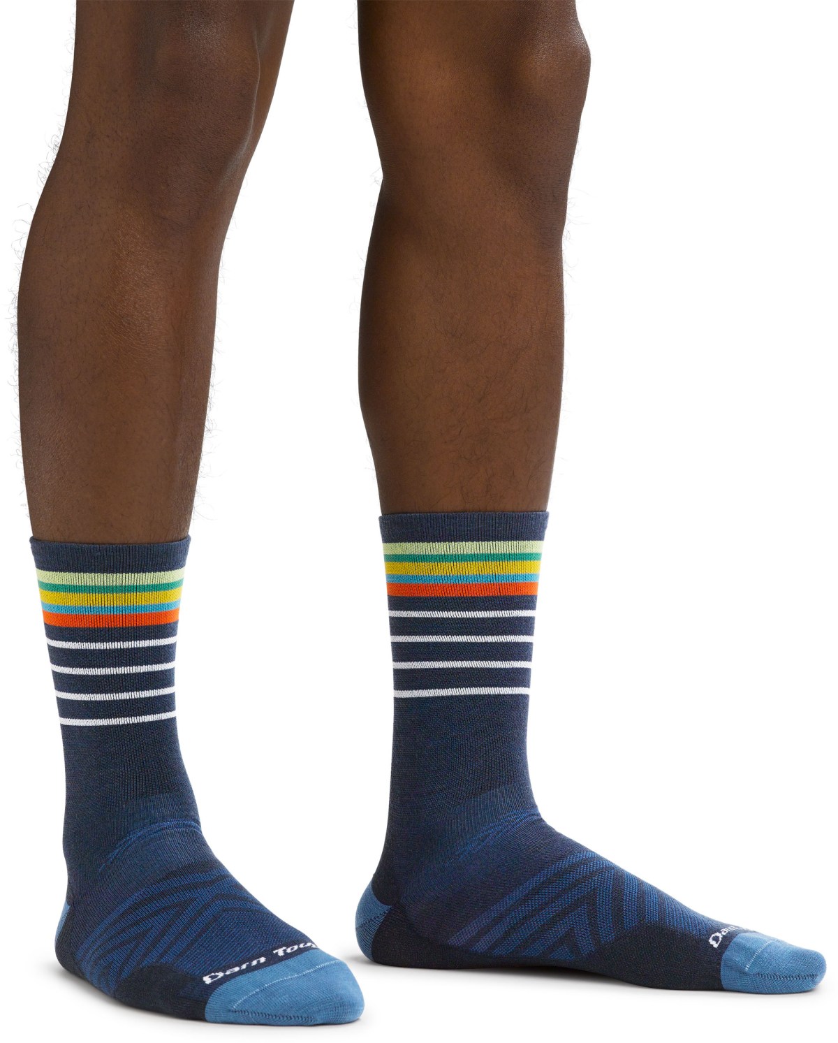 A person with dark brown skin wearing the Darn Tough Stride Micro Crew Ultralightweight Socks - Men's.