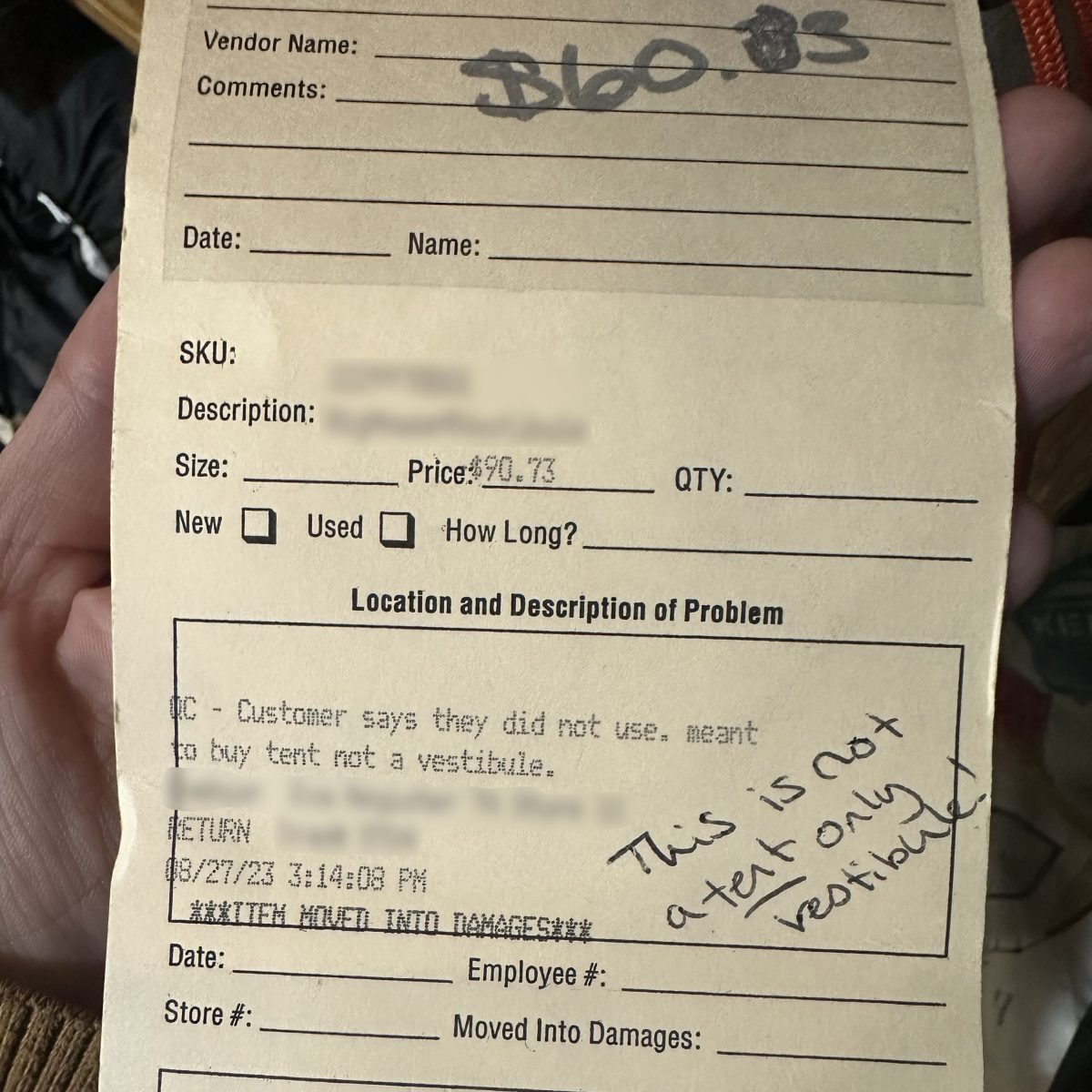 Return tag that reads: "Customer says they did not use. meant to buy tent not a vestibule."