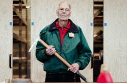 A person holds an ice axe