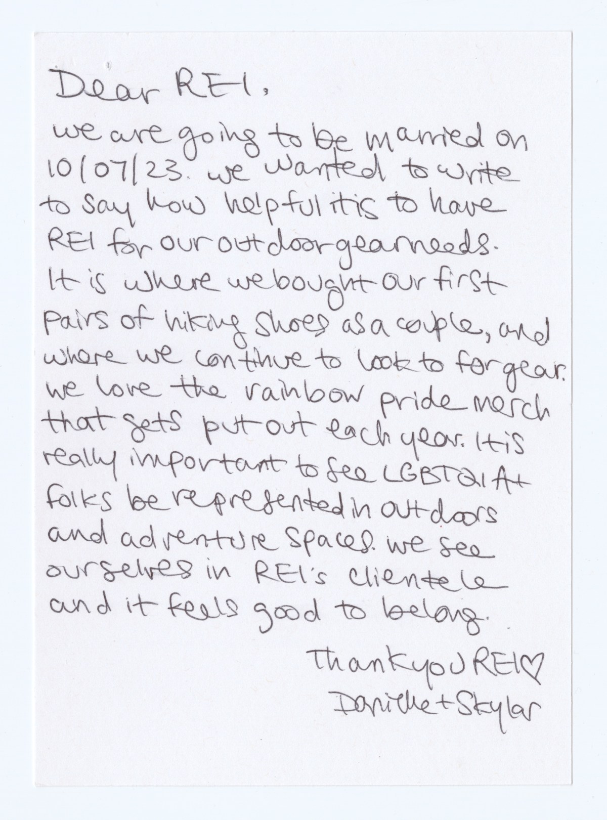 Another hand-written note in black pen on white paper