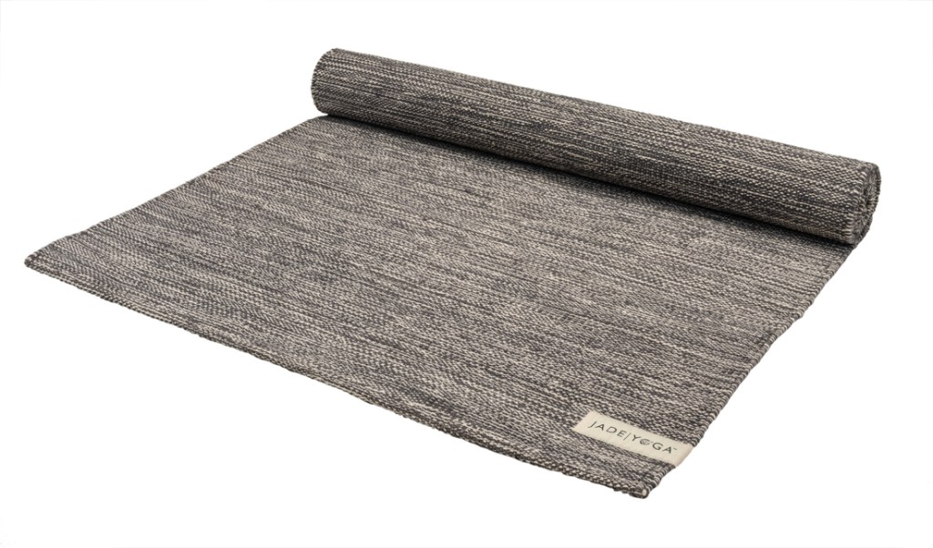 A woven yoga "rug" that is made from woven material as opposed to foam.