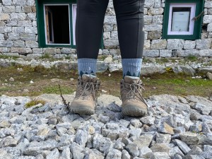 Picture of a woman's feet in a pair of hiking boots.