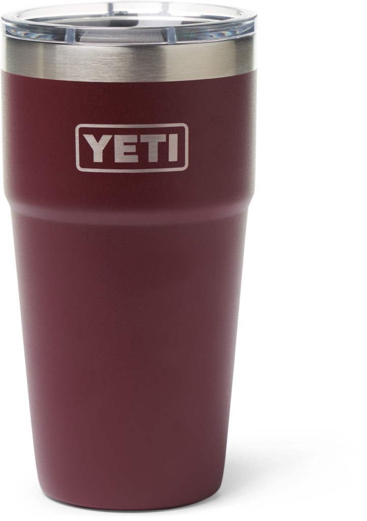 A dark purple stackable reusable coffee cup with a YETI logo.