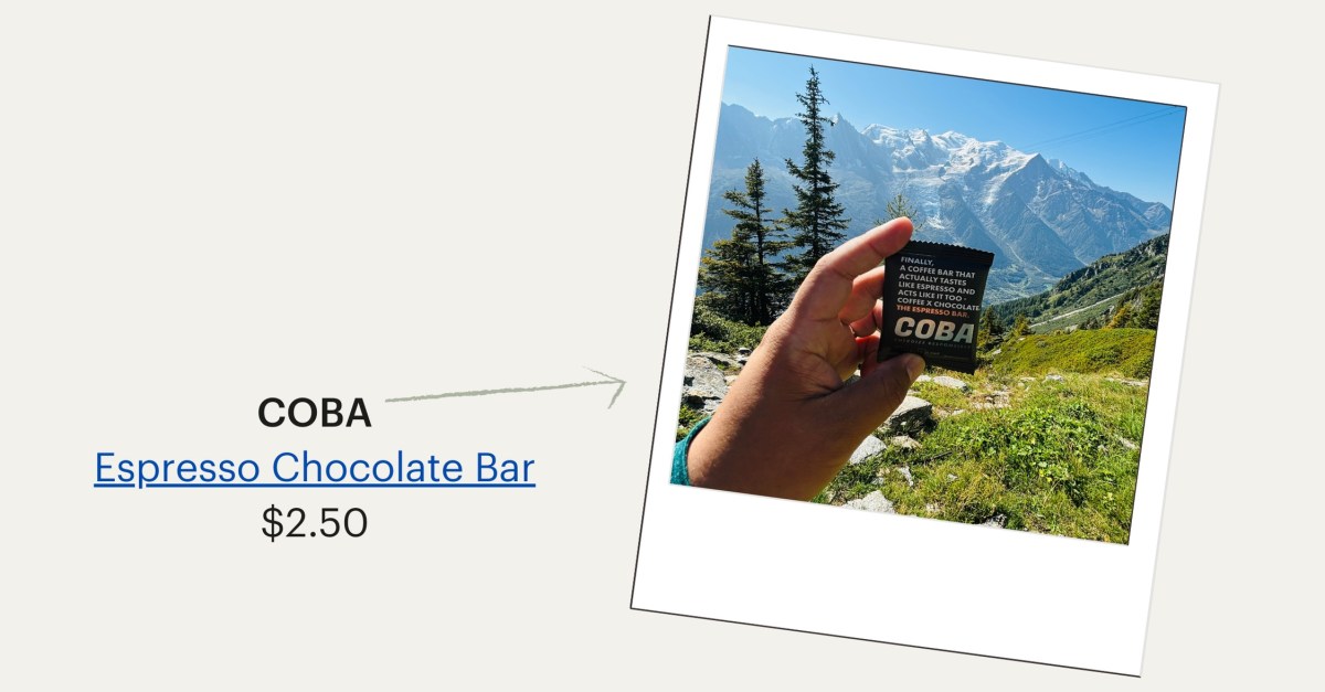 A photo of the COBA brand Espresso Chocolate Bar set against a scenic mountain backdrop, $2.50.