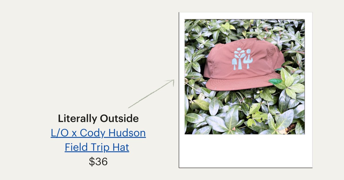 A five-panel cap in the color clay in front of leaves. Literally Outside L/O x Cody Hudson Field Trip Hat, $36