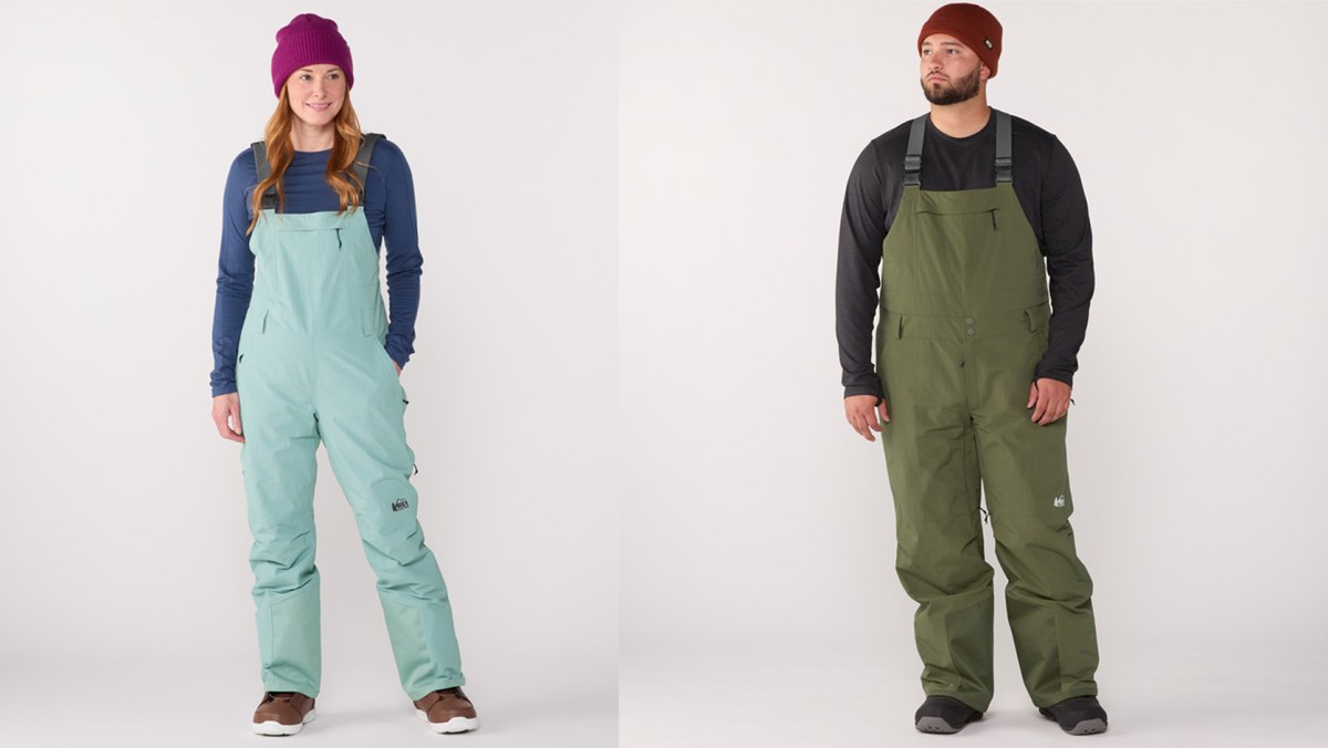 Two people wearing REI Powderbound Insulated Snow Bibs