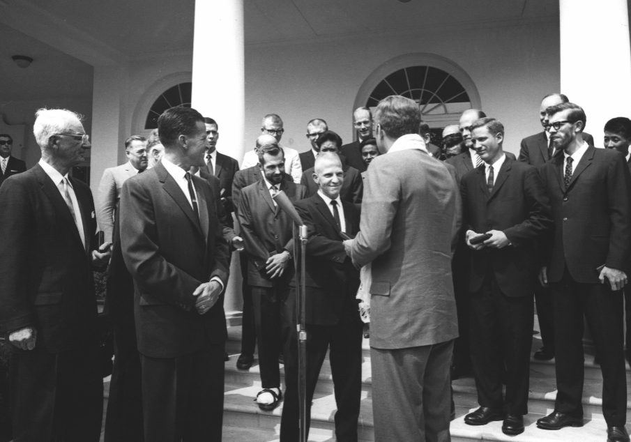 Whittaker, pictured in the far back, joins the Everest expedition team at the White House with President John F. Kennedy